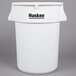 A white plastic Continental Huskee trash can with black text.