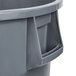 A Continental gray round trash can with lid and dolly.