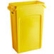 A yellow Rubbermaid Slim Jim trash can with a lid.