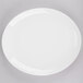 A Homer Laughlin Alexa china platter with a white rim on a gray surface.
