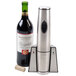 A Waring charging base for an electric wine opener next to a bottle of wine.