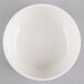A Homer Laughlin Ameriwhite Alexa china bowl on a gray background.