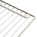 A close up of a stainless steel Avantco middle rack.