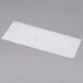 A white rectangular piece of Durable Packaging wax paper.
