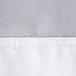 A white Hookless shower curtain with a stripe of white fabric.
