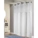 A white Hookless shower curtain with a white trim.