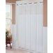 A Hookless white shower curtain with a translucent window and chrome rings hanging in a bathroom.