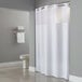A white Hookless shower curtain with a poly-voile translucent window.