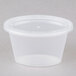 A Pactiv Newspring oval plastic souffle container with a lid.