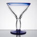 A clear Libbey martini glass with a blue rim and base.