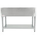 A stainless steel Eagle Group hot food table with a shelf.