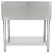 A stainless steel Eagle Group hot food table with legs and a shelf.