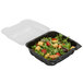 A Polar Pak clear hinged take-out container with salad inside.