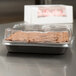 A brownie in a Solut Bake and Show paperboard container.