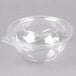 A Polar Pak clear plastic bowl with a plastic lid.