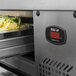 A Turbo Air refrigerated chef base with an extended top and two drawers on a metal bar.