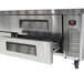 A Turbo Air stainless steel chef base with four drawers.