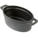 A black oval cast iron pot with a lid.