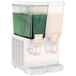 The white Cecilware refrigerated beverage dispenser bowl with a green drink inside.