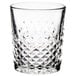 A close up of a Libbey double old fashioned glass with a diamond cut design.