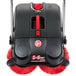 A black and red Hoover SpinSweep Pro outdoor sweeper with red handles.