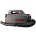 An Oreck XL Pro 5 canister vacuum cleaner in black and red.