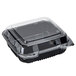 A black plastic Polar Pak clear hinged take-out container with a clear lid.