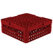 A red plastic rack with holes designed for Vollrath TR3AAP14 plates.