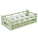 A light green plastic Vollrath rack with 10 compartments.