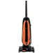 A black and orange Hoover Task Vac upright vacuum cleaner.