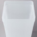 A white square container with a white lid.