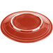 A red Fiesta® dinner plate with a white band.