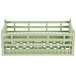 A light green plastic open rack with handles and holes.