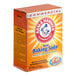 An Arm & Hammer box of baking soda on a kitchen counter.