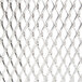 A close-up of a stainless steel mesh with a coated handle.