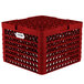 A red Vollrath Traex Plate Crate with compartments for plates and holes.