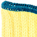 A yellow and blue knitted Cordova glove with a blue trim.
