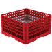 A red plastic Vollrath Traex Plate Crate with metal wire dividers.