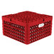 A red plastic Vollrath Traex plate rack with 22 compartments.