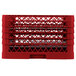 A red plastic Vollrath Traex plate rack with metal rods.