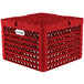 A red Vollrath Traex plate rack with compartments.