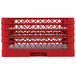 A red plastic Vollrath Traex Plate Crate with 30 compartments.