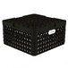 A black plastic Vollrath Traex Plate Crate with 22 compartments and holes.