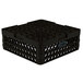 A black plastic Vollrath Traex Plate Crate with 38 compartments and holes.