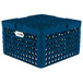 A blue plastic Vollrath Plate Crate with holes.