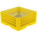 A yellow plastic Vollrath Plate Crate with a metal grate.