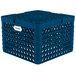 A royal blue plastic Vollrath Traex Plate Crate with 19 compartments for plates.