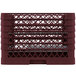 A burgundy Vollrath Traex plate rack with 19 compartments.