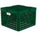 A green Vollrath Traex Plate Crate with 19 compartments.