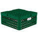 A green plastic Vollrath Traex Plate Crate with holes.